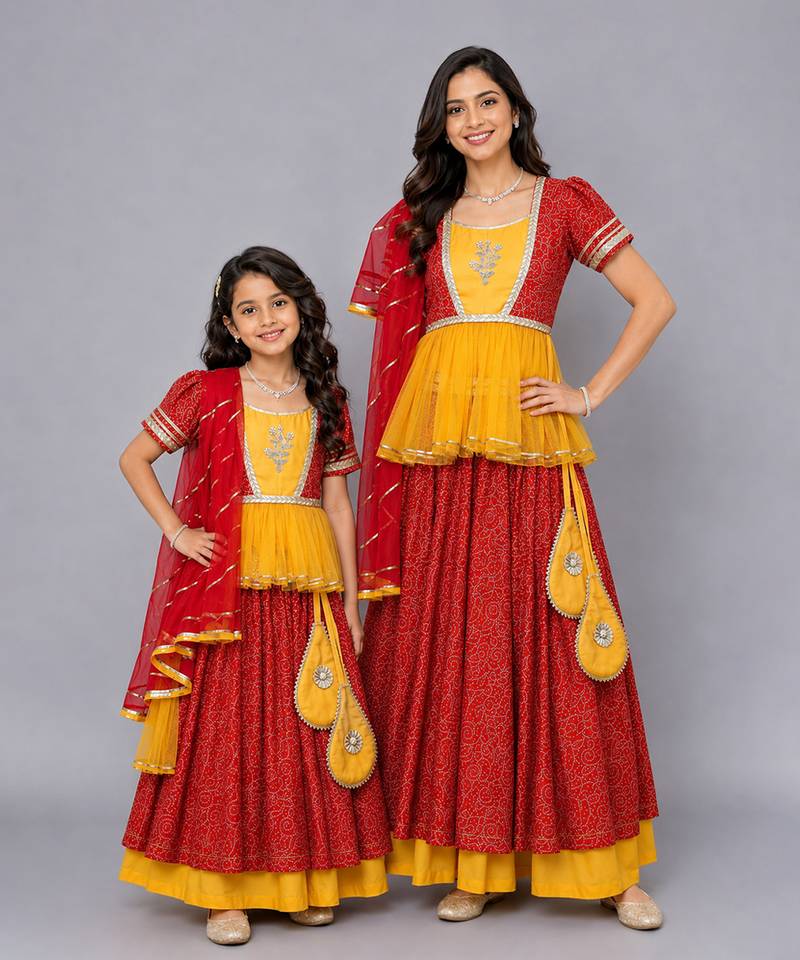 Mother daughter orange yellow peplum blouse lehenga set