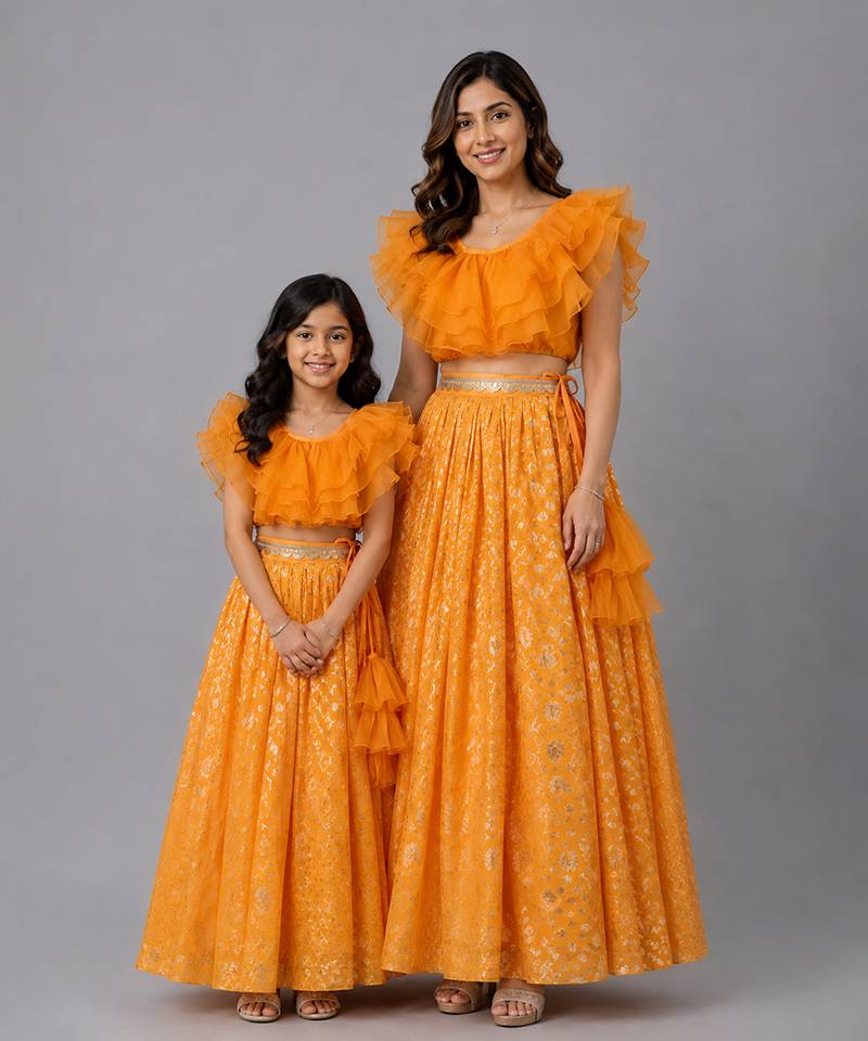 Mother daughter orange embroidered organza lehenga set