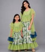 Mother daughter green printed organza lehenga set