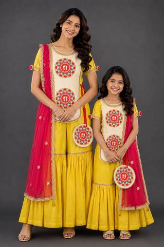 Mother daughter yellow embroidered cotton silk sharara set