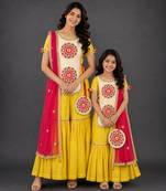 Mother daughter yellow embroidered cotton silk sharara set