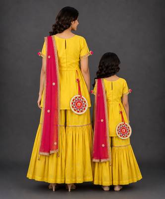 Mother daughter yellow embroidered cotton silk sharara set 2