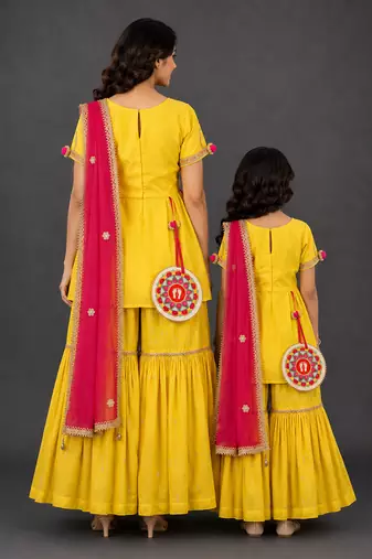 Mother daughter yellow embroidered cotton silk sharara set