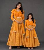 Mother daughter orange embroidered organza anarkali set