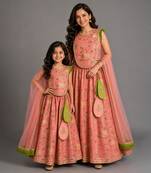Mother daughter peach printed cotton silk lehenga set