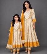 Mother daughter off white and yellow cotton silk floral anarkali suit