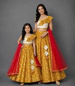 Mother daughter mustard yellow printed cotton silk lehenga set