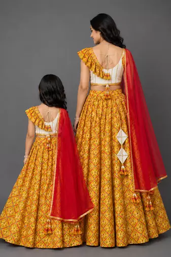 Mother daughter mustard yellow printed cotton silk lehenga set
