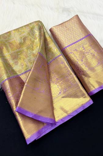 green woven kanchipuram silk blend saree with blouse piece