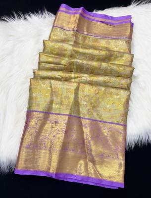 green woven kanchipuram silk blend saree with blouse piece 2