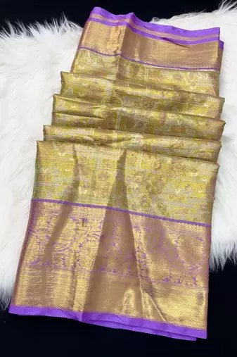 green woven kanchipuram silk blend saree with blouse piece