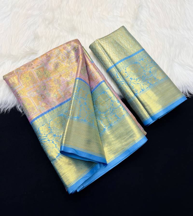 pink woven kanchipuram silk blend saree with blouse piece