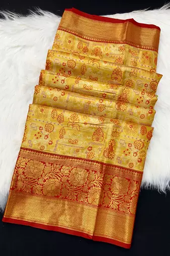 yellow woven kanchipuram silk blend saree with blouse piece