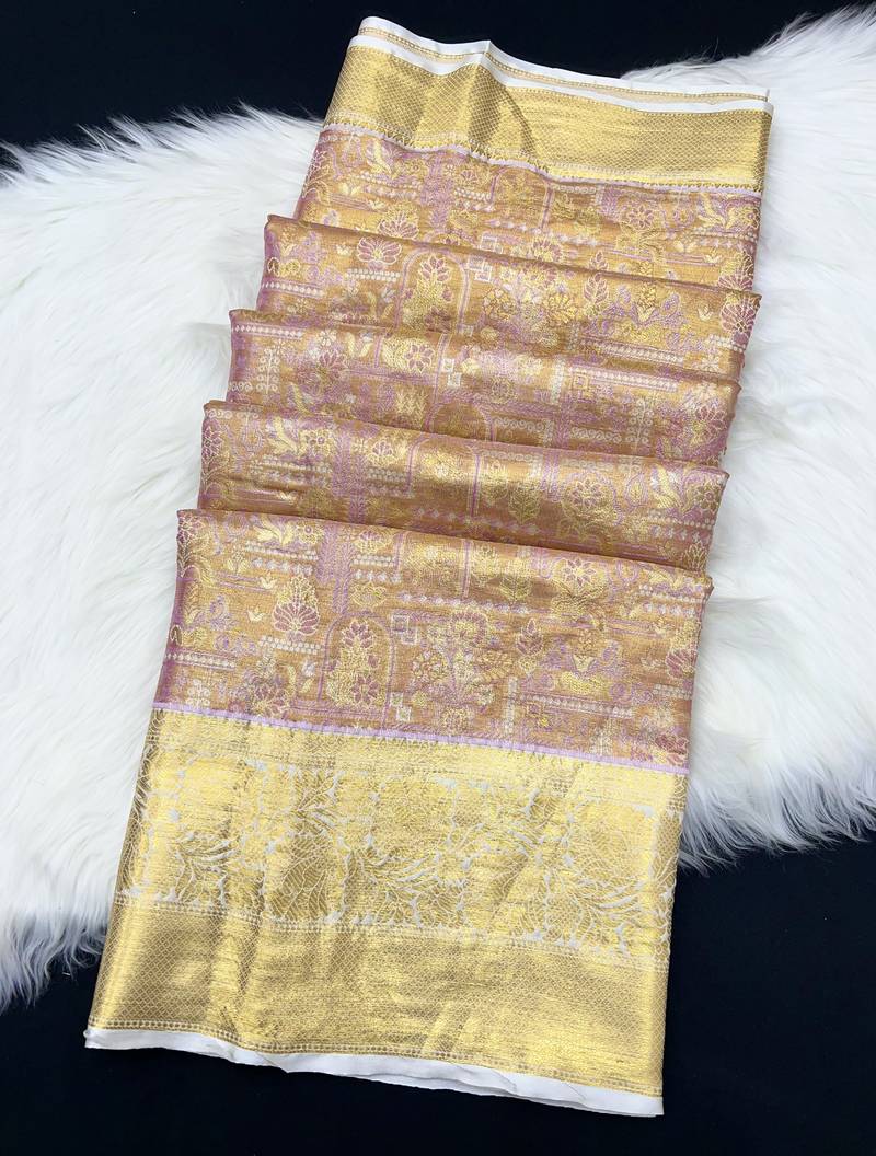 pink woven kanchipuram silk blend saree with blouse piece