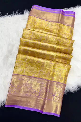 yellow woven kanchipuram silk blend saree with blouse piece