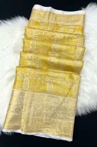 yellow woven kanchipuram silk blend saree with blouse piece