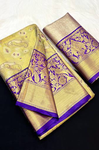 green woven kanchipuram silk blend saree with blouse piece