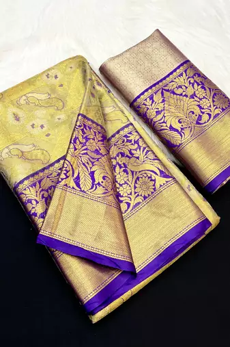green woven kanchipuram silk blend saree with blouse piece