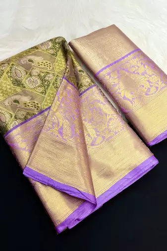green woven kanchipuram silk blend saree with blouse piece