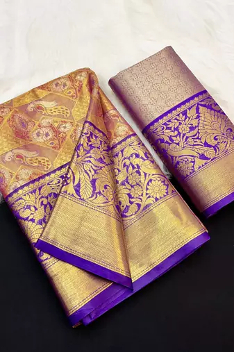 magenta woven kanchipuram silk blend saree with blouse piece