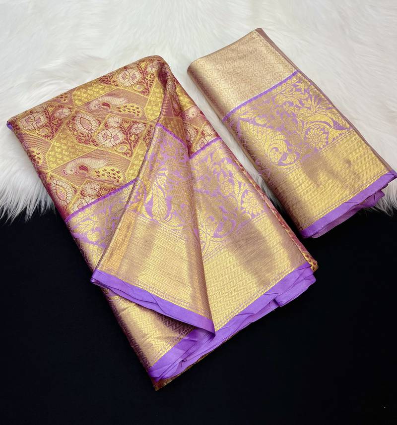 pink woven kanchipuram silk blend saree with blouse piece