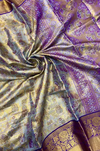 blue woven kanchipuram silk blend saree with blouse piece