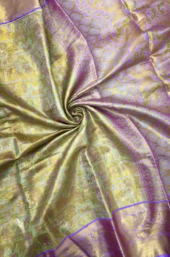 green woven kanchipuram silk blend saree with blouse piece