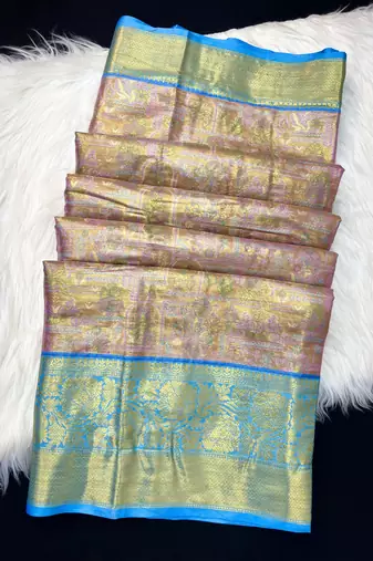pink woven kanchipuram silk blend saree with blouse piece