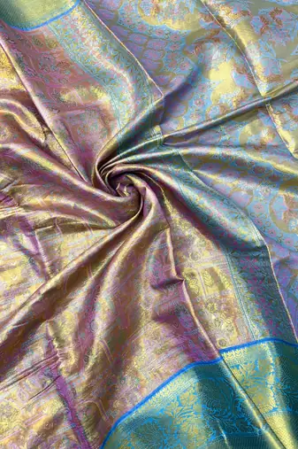 pink woven kanchipuram silk blend saree with blouse piece