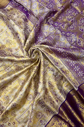 cream woven kanchipuram silk blend saree with blouse piece