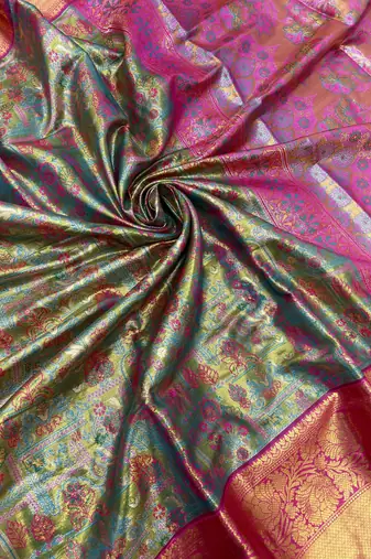 olive green woven kanchipuram silk blend saree with blouse piece