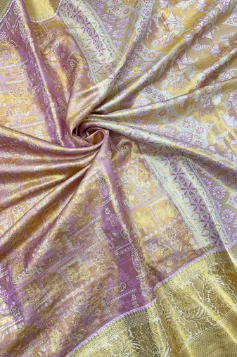 pink woven kanchipuram silk blend saree with blouse piece