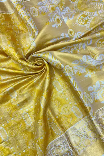 yellow woven kanchipuram silk blend saree with blouse piece