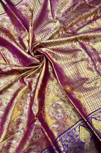 magenta woven kanchipuram silk blend saree with blouse piece