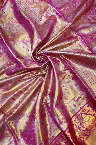 pink woven kanchipuram silk blend saree with blouse piece
