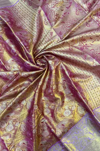 pink woven kanchipuram silk blend saree with blouse piece