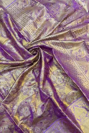 purple woven kanchipuram silk blend saree with blouse piece