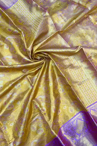 yellow woven kanchipuram silk blend saree with blouse piece