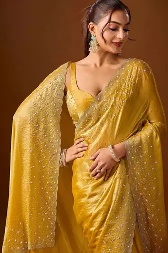 Yellow embellished zari silk blend heavy work saree