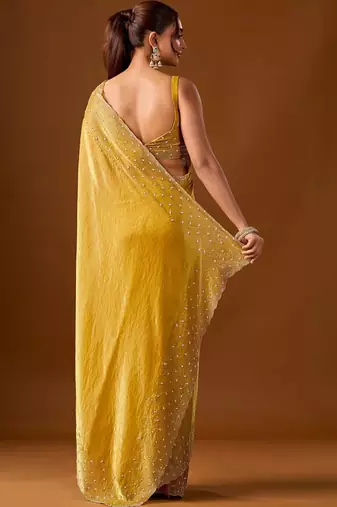 Yellow embellished zari silk blend heavy work saree