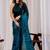 Teal floral beads and stones organza saree