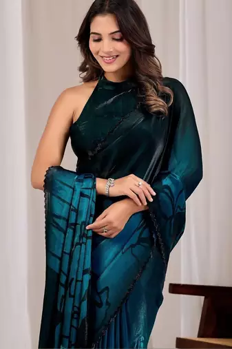 Teal floral beads and stones organza saree
