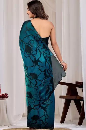 Teal floral beads and stones organza saree