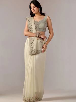 Cream embroidered  chiffon saree 1