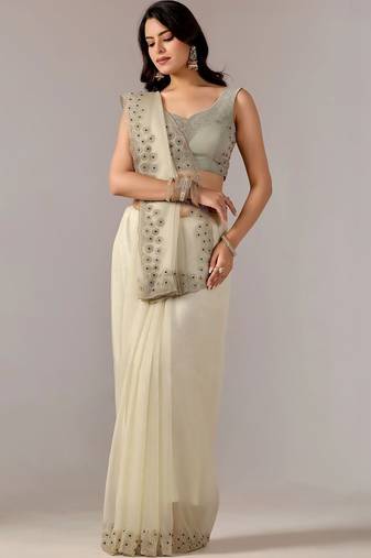 Cream embroidered  chiffon saree