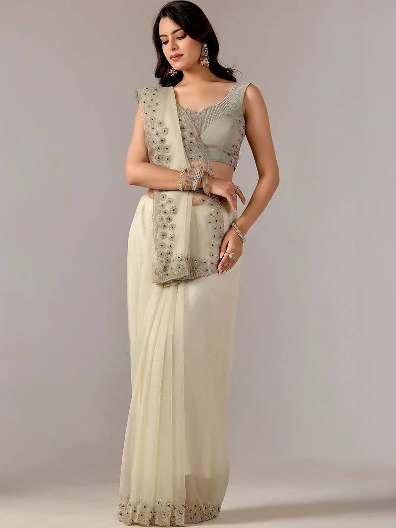 Cream embroidered  chiffon saree