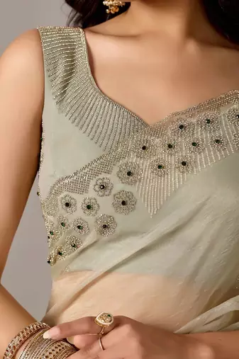 Cream embroidered  chiffon saree