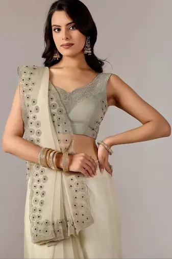 Cream embroidered  chiffon saree