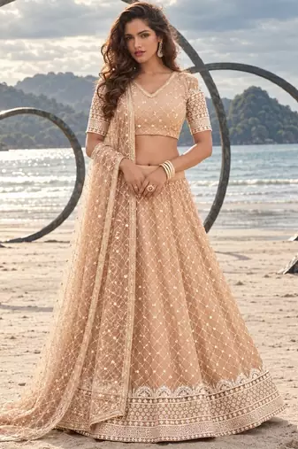 BEIGE YELLOW NET THREAD WITH ZARI AND SEQUIN WORK FESTIVE LEHENGA CHOLI