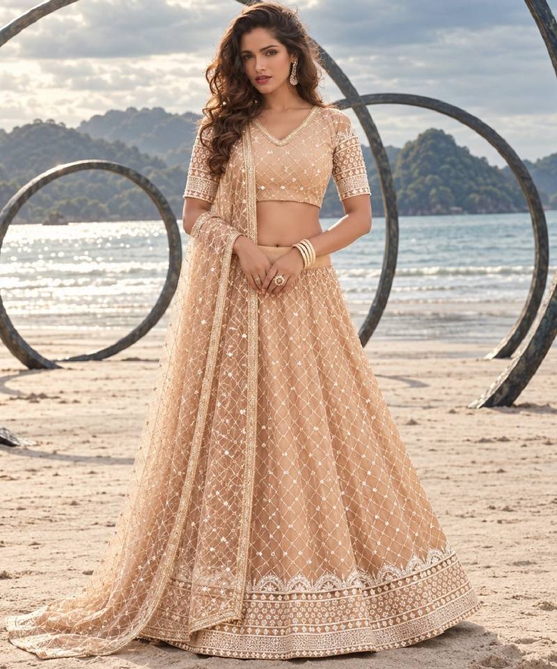 BEIGE YELLOW NET THREAD WITH ZARI AND SEQUIN WORK FESTIVE LEHENGA CHOLI